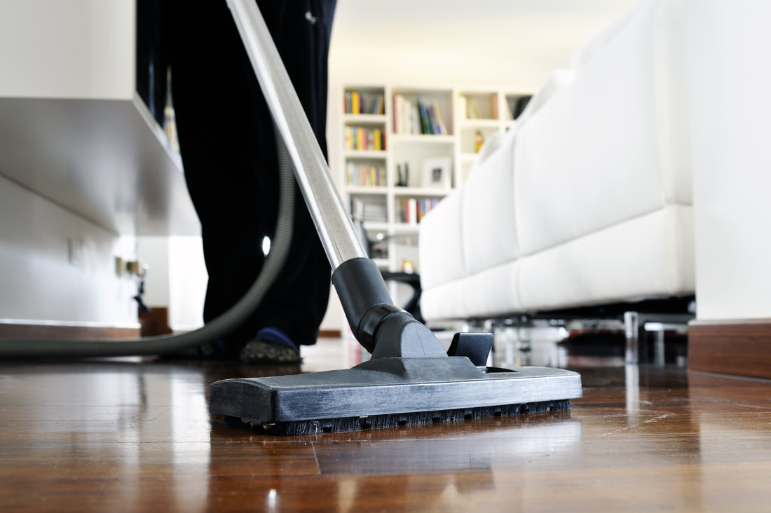 Cleaning Technician using professional equipment to clean any type of surface.